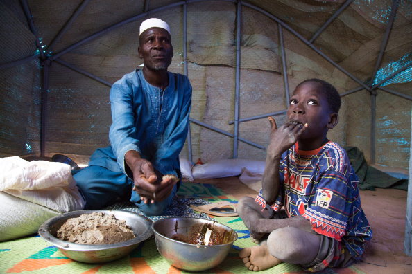 Photo: WFP/Marwa Awad, En familie spiser et måltid i Burkina Faso