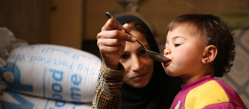 Syrisk mor mader barn
